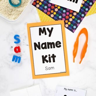 a folder with 'my name kit' printed on the cover surrounded by name kit pieces that spell the name sam