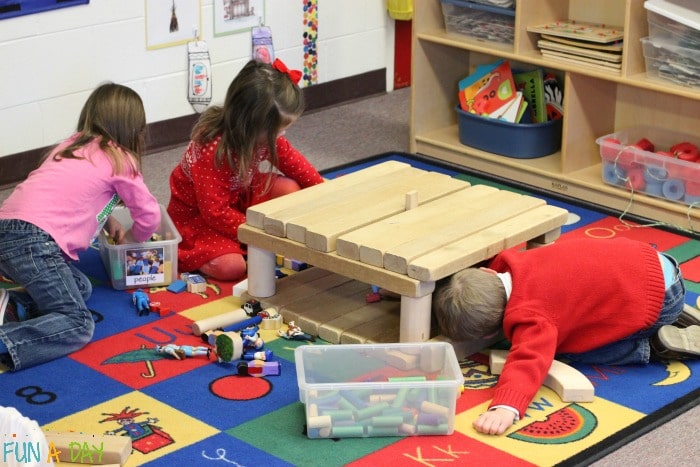 children playing in block centers in preschool