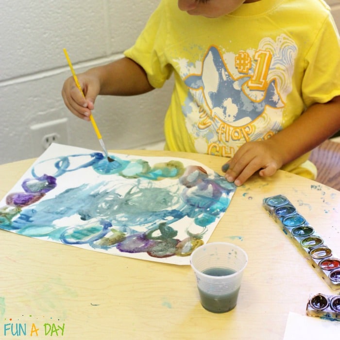 Painting with watercolors during center time
