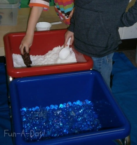 Fake snow and water beads are fun to explore with winter sensory activities