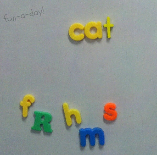 magnetic letters spelling out cat