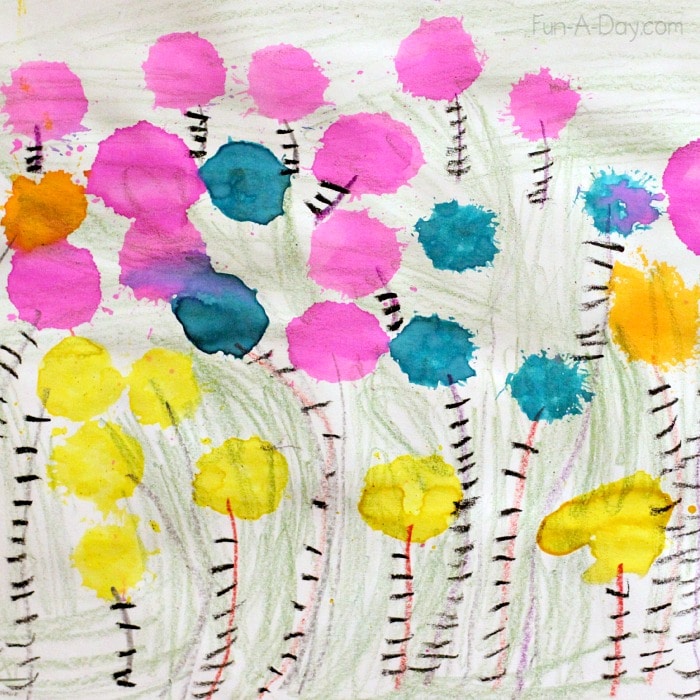 preschooler's painting of Truffula trees for Dr. Seuss activities