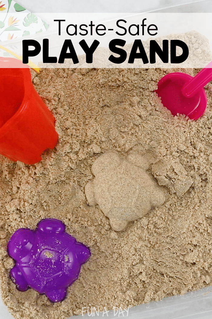 toddler sand with beach toys and text that reads taste-safe play sand