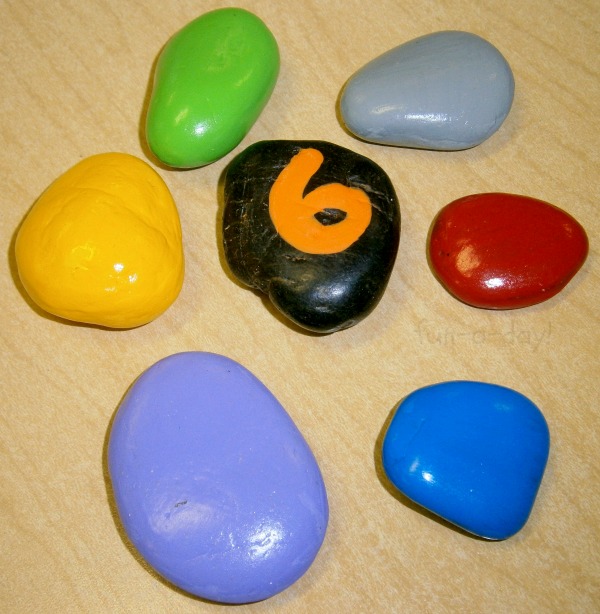Math Activities for Preschoolers from www.fun-a-day.com -- Using number rocks and rainbow rocks to teach children 1:1 correspondence in a fun way 