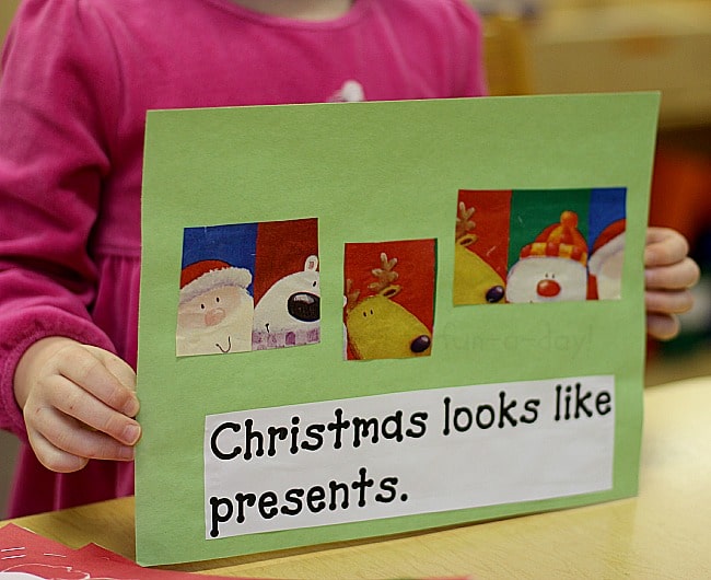 preschooler holding a page of her christmas book that reads christmas looks like presents