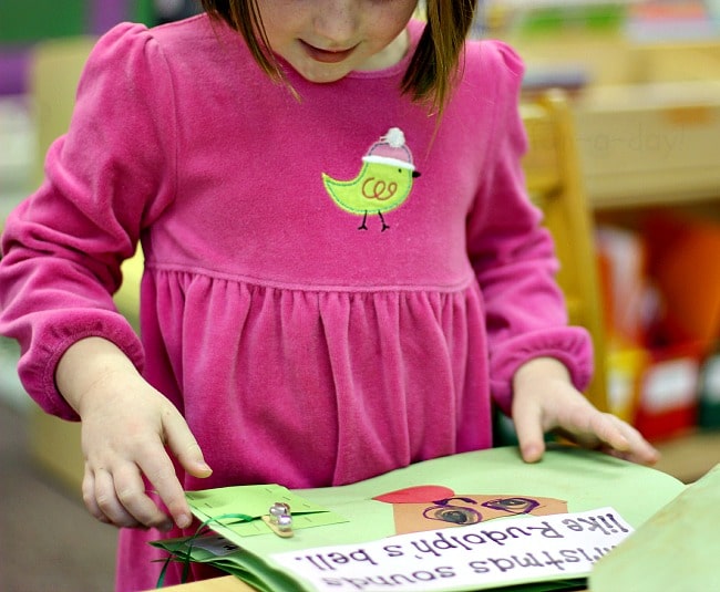 preschooler reading christmas five senses book