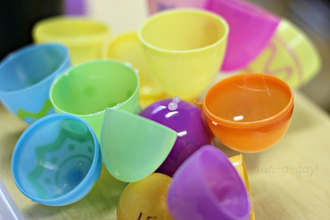 Open-ended Easter art project in preschool using plastic eggs