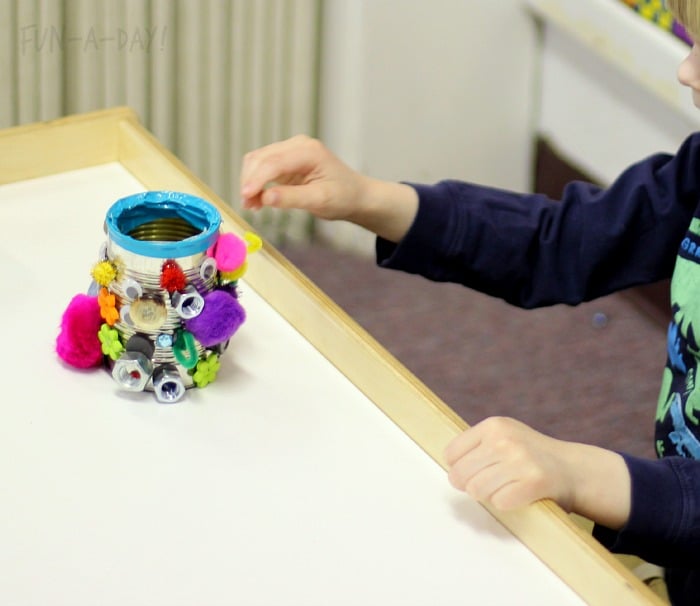 Creating magnetic robot art with tin cans and craft supplies
