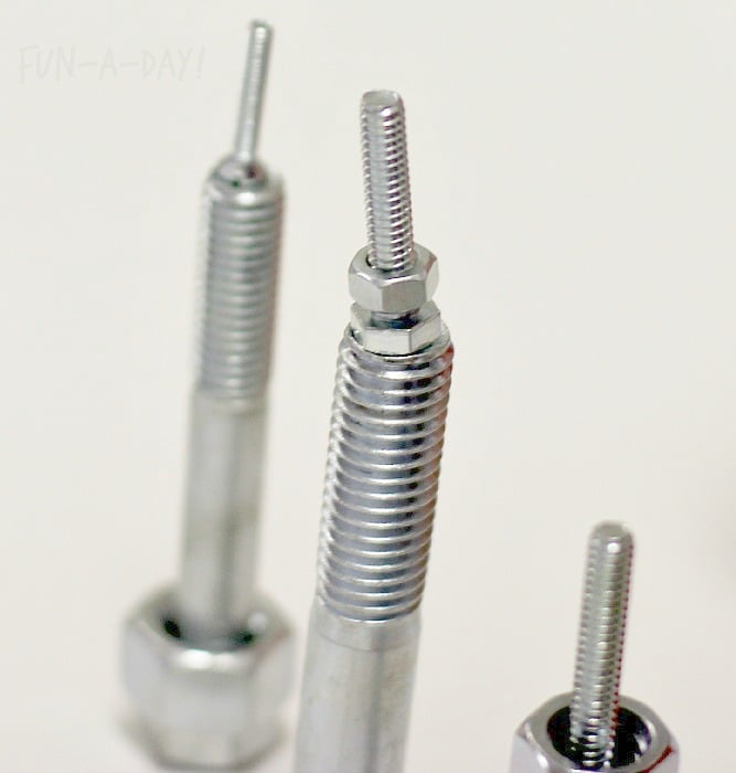 stacking nuts and bolts during a fine motor activity