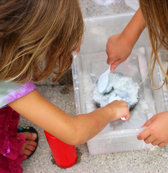 Some children were very focused on using salt to save the frozen dinosaurs