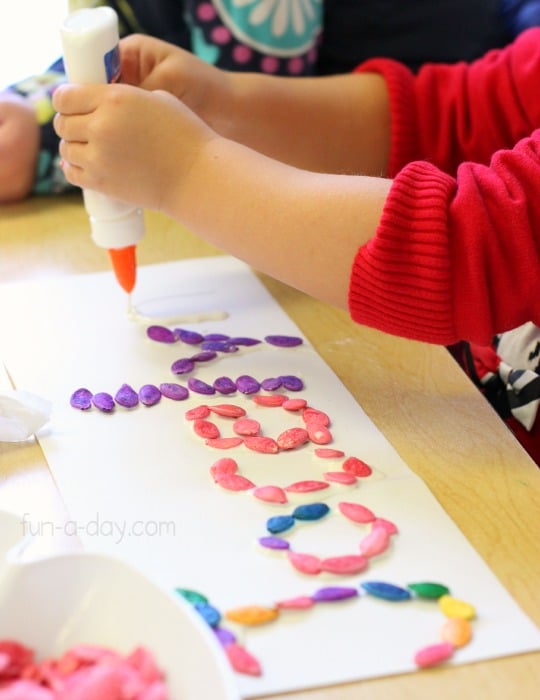 Colorful pumpkin seeds name activities for preschoolers