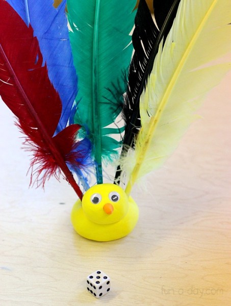 Kids love rolling the dice and adding feathers during this turkey math dice game