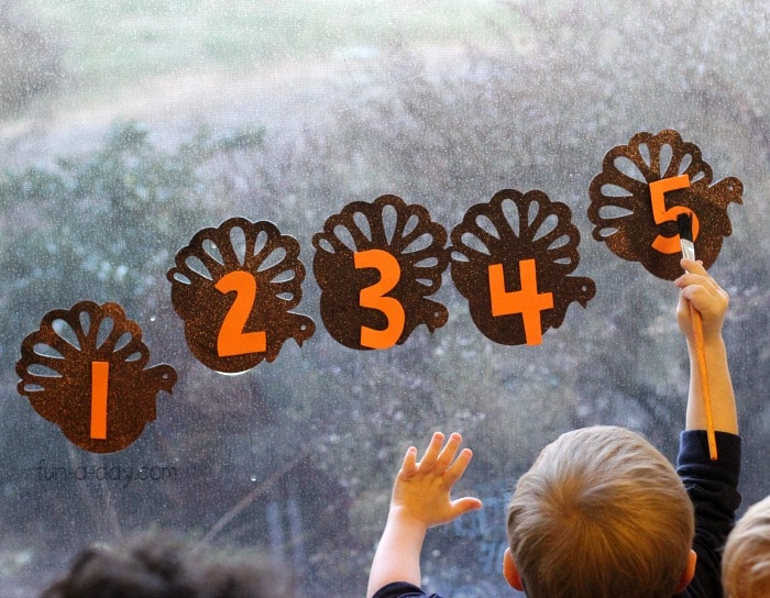 Thanksgiving math with foam turkeys and foam numbers