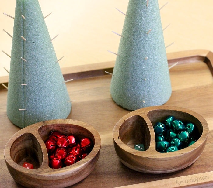 Fine motor Christmas math game with jingle bells