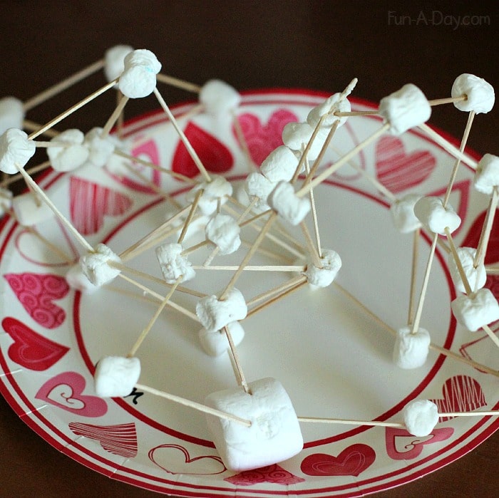 Engineering project for kids using toothpicks and marshmallows to make arctic animal dens