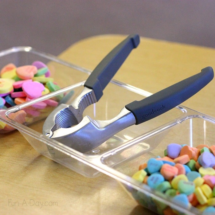 Use nutcrackers to break candy hearts and strengthen fine motor skills