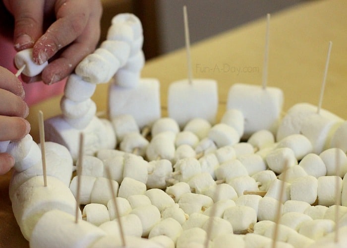 an in-depth engineering project for kids - creating winter animals dens with marshmallows