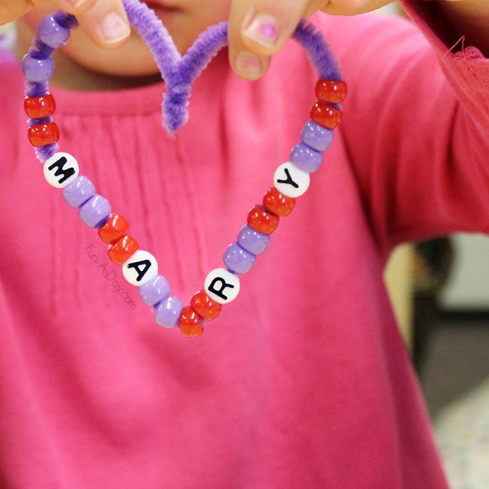 Beaded name heart valentine craft - great for fine motor skills, learning math patterns, and name work!