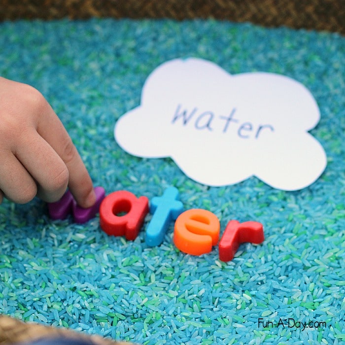 Making words in a preschool Earth Day sensory bin