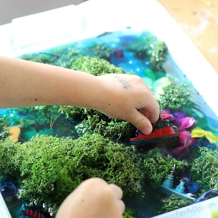 The simple pond sensory play idea exploded into a small world that included ships coming to rescue butterflies from a polluted pond!