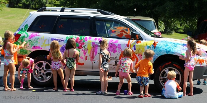 Collaborative fun summer art project for kids - painting and washing a car together!