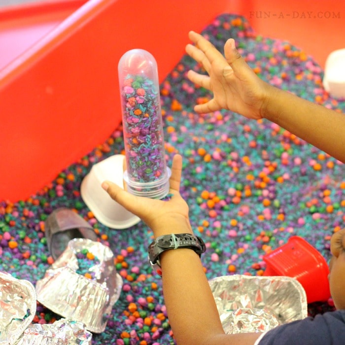 Measuring and pouring are important parts of a preschool sensory activity. I love this fun space one!