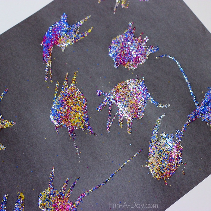 Straw blowing glitter art for kids - what fun!