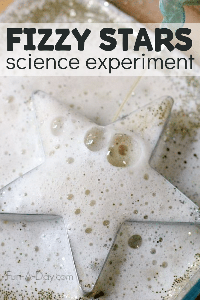 Fizzing baking soda activity with star cookie cutter and text that reads fizzy stars science experiment