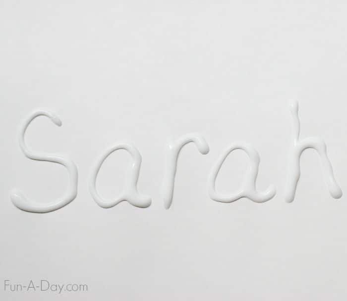 the name 'Sarah' written in glue in preparation for a scratch and sniff name art activity