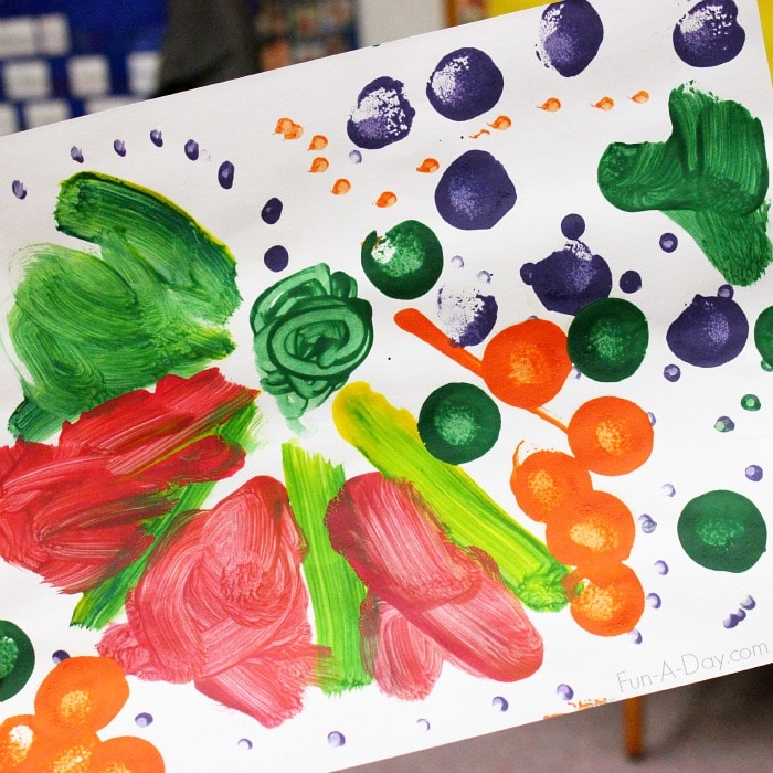 preschool child's painting using dots