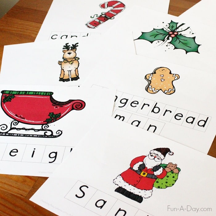 Santa, sleigh, gingerbread man, reindeer, and holly Christmas word cards printable.