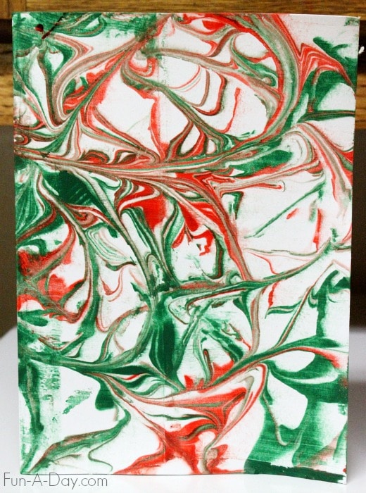 a card that has been made from marbled shaving cream
