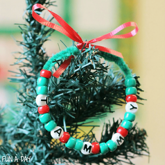 Preschool wreath ornament with child's name incorporated into the beads.