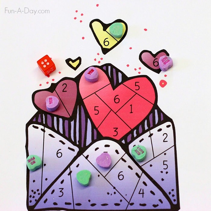 Playing free printable valentine games with candy hearts