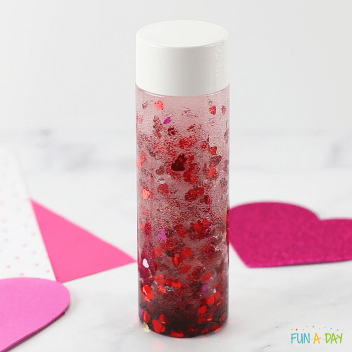 valentine sensory bottle made with heart glitter and clear glue