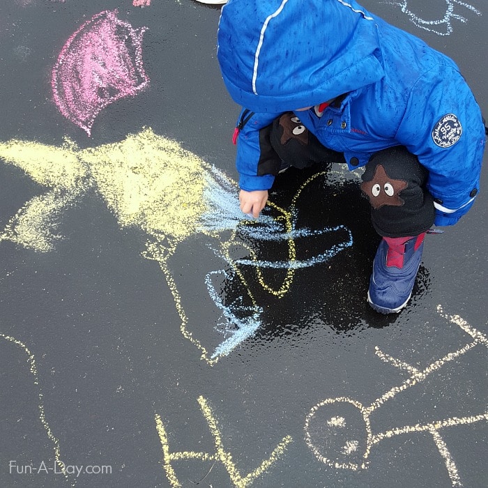 Rainy day activities for kids on spring break - making art in the rain