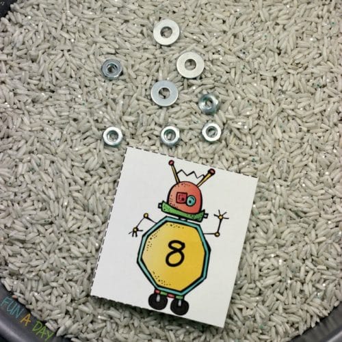 Free printable robot numbers to use with a sensory writing tray