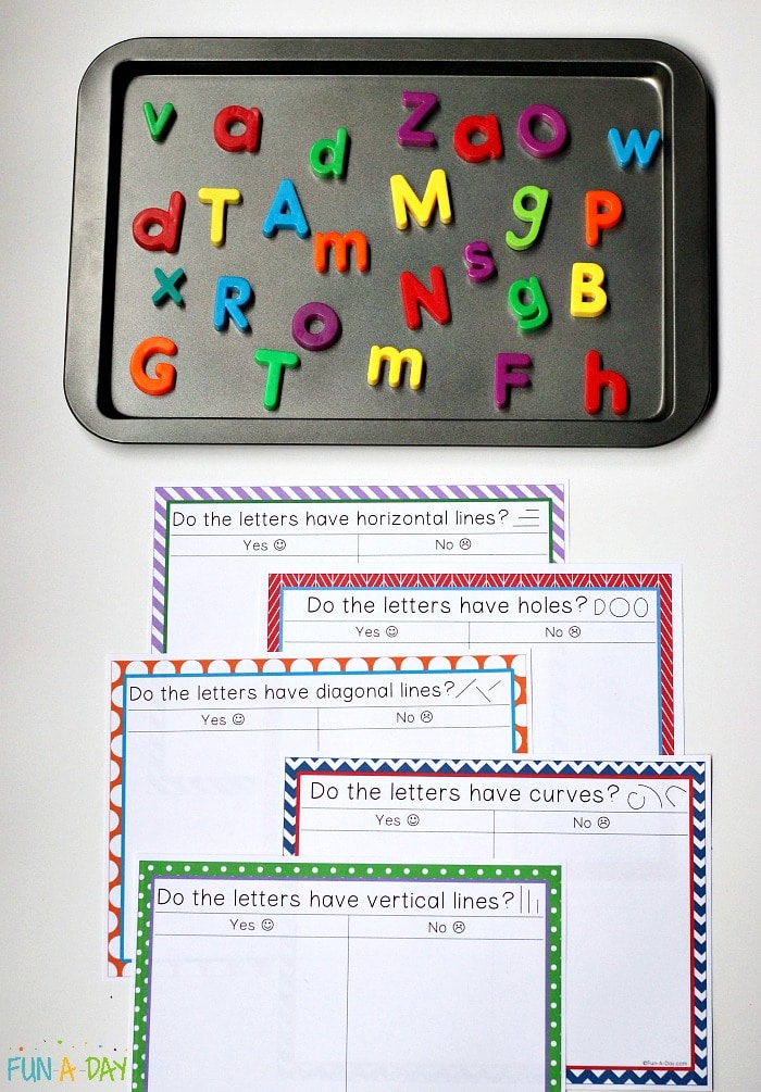 Free printable mats for letter sorting, along with a cookie sheet and magnetic letters.