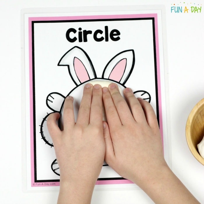 Play dough on the printable bunny circle mat