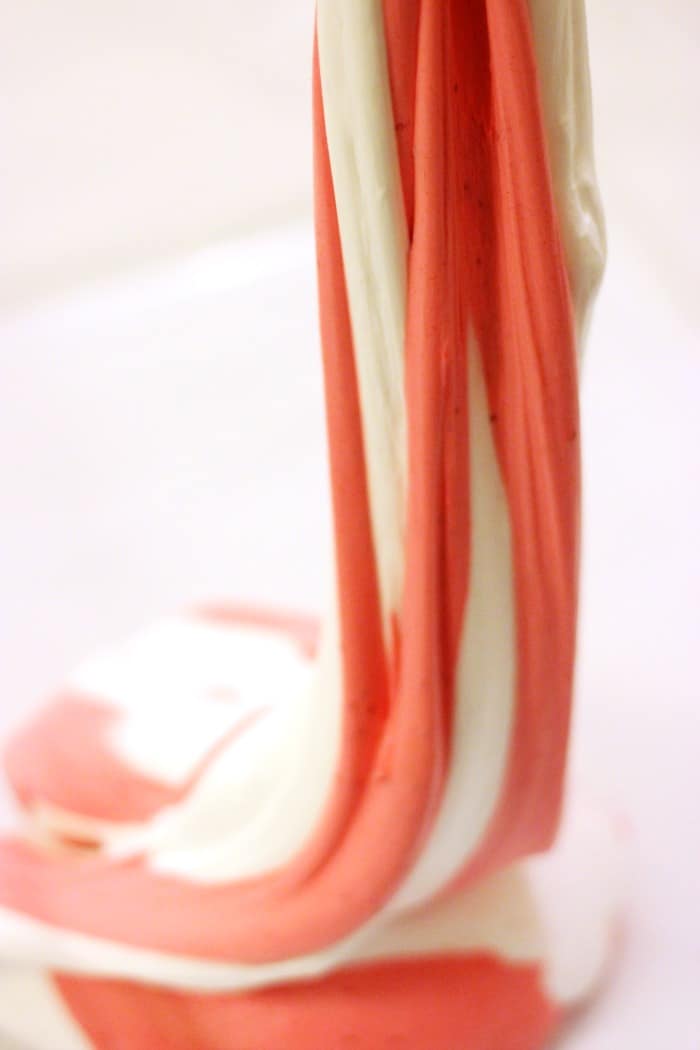 Stretching candy cane shaving cream slime