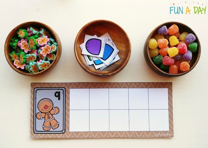 Gingerbread man ten frame paired with bowls of mini erasers and gum drops