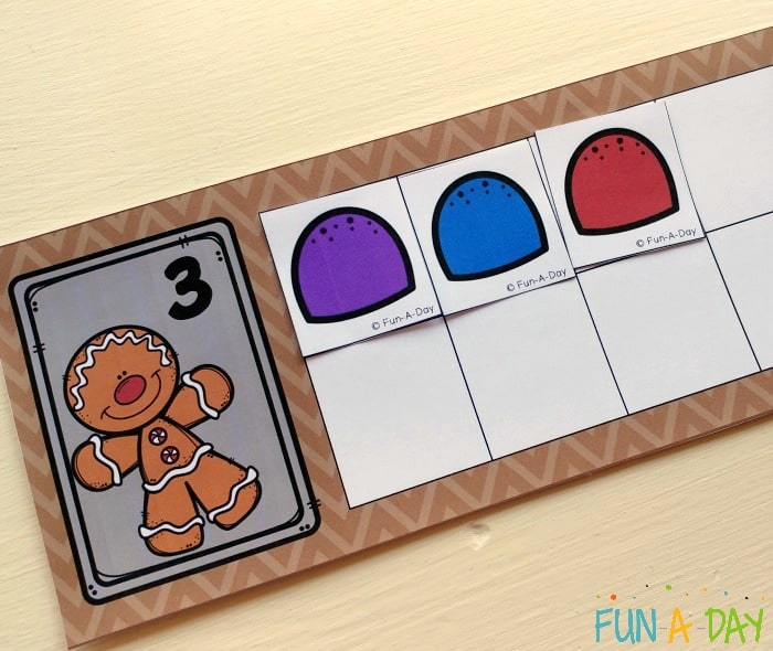 Close up of printable 10 frame with the number three and three printable gumdrops