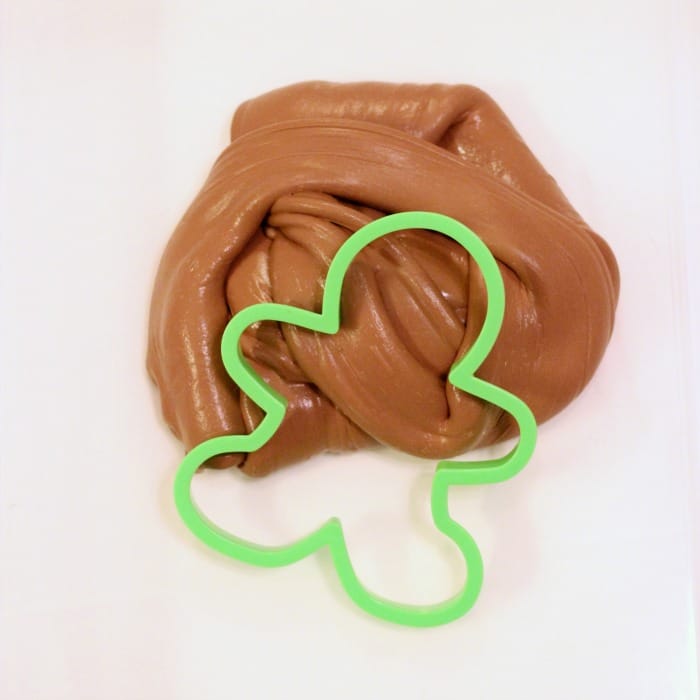 cookie cutter with gingerbread butter slime with model magic