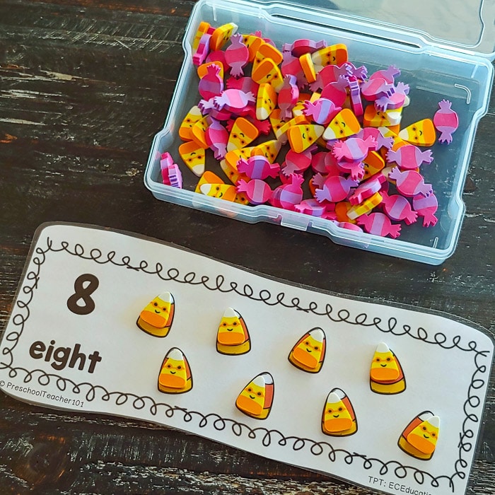 Printable number strip with 8 eight written on it. Preschoolers add candy mini erasers to the numbers.