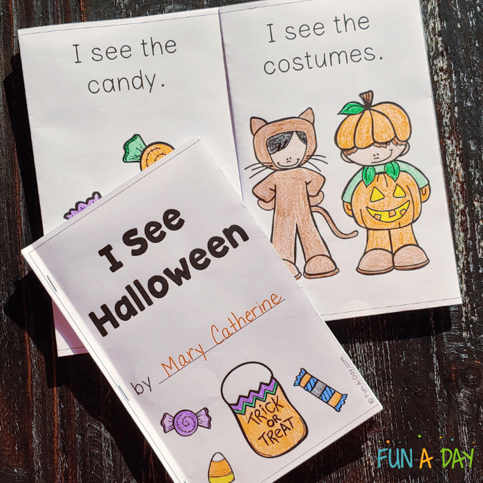 Two printable preschool books, 1 closed and 1 open. The closed book has text that reads I See Halloween by Mary Catherine. The open book has text that reads I see the candy. I see the costumes. The pages have clip art of candy and costumes.