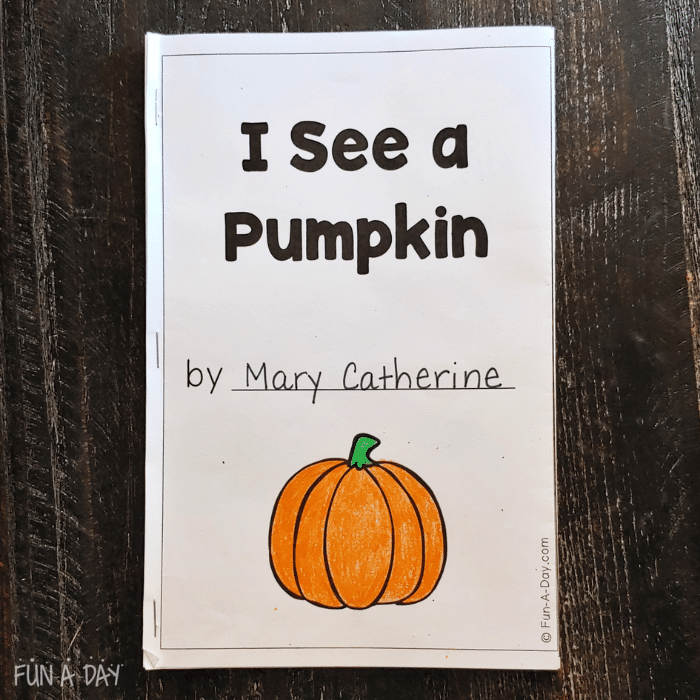 I See a Pumpkin printable front cover with colored in pumpkin.