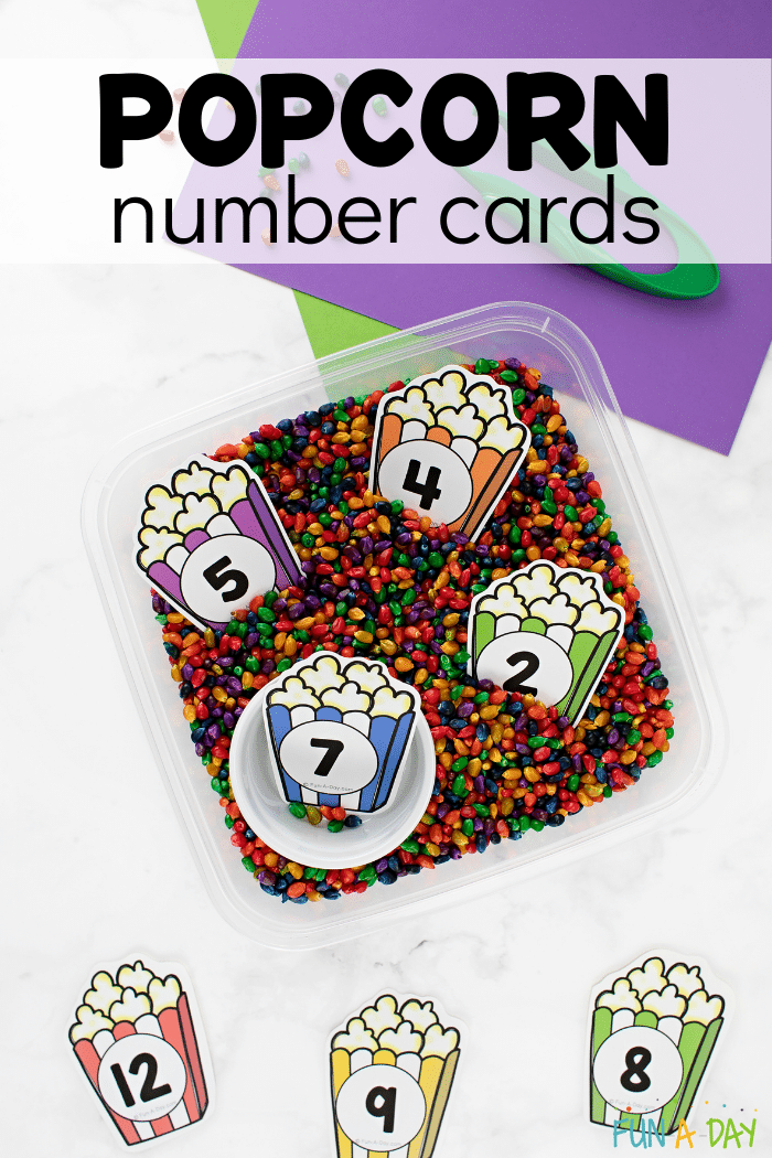 Popcorn number card activity with rainbow corn kernels and text that reads 'popcorn number cards.'