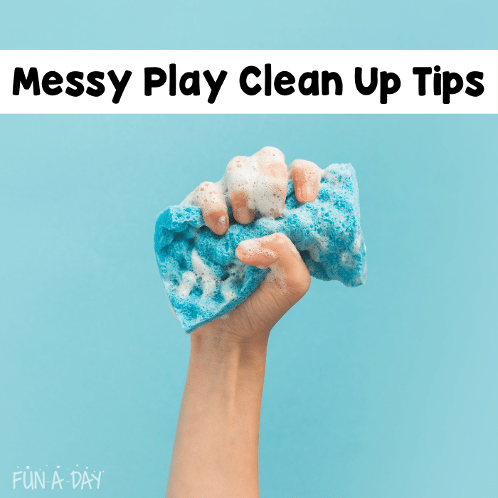 Soapy hand holding blue sponge, with text that reads messy play clean up tips