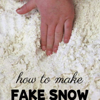 Preschooler's hands molding fake snow made with flour