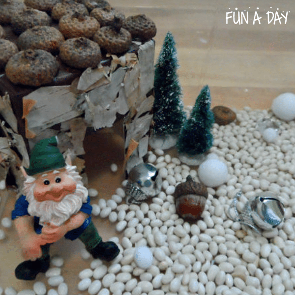 Gnome toy and DIY nature house in a preschool winter small world